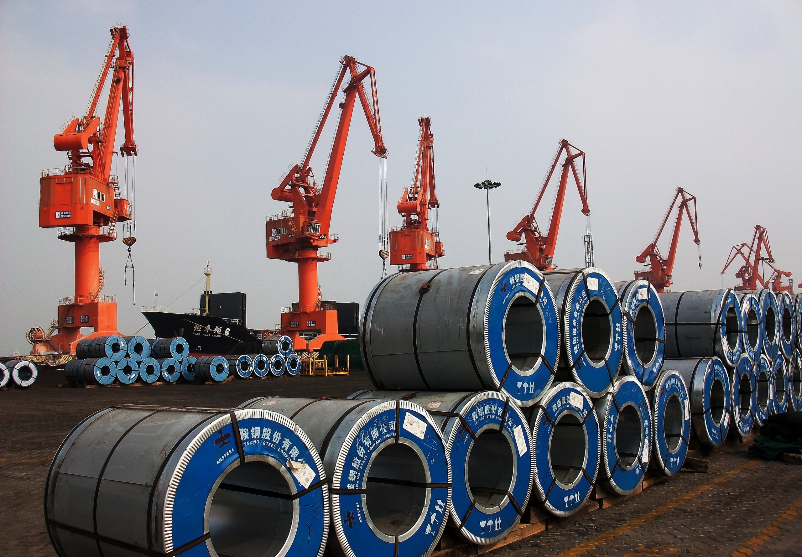 Steel cargo loaded for shipping at export port